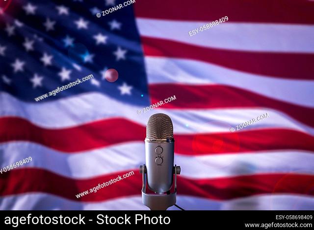 A Microphone In Front Of A USA Flag Ready For A Public Address From The President Or Other Government Figure
