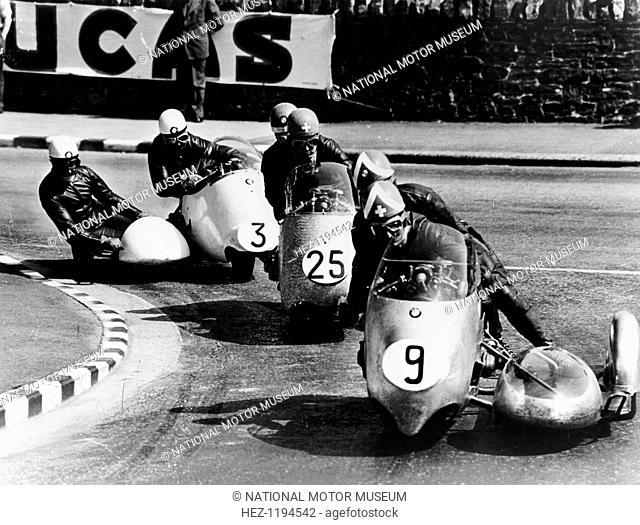 Fritz Scheidegger, Walter Schneider and Helmut Fath competing in a sidecar race, 1959. Schneider, with Hans Strauss, won for the second year running for BMW
