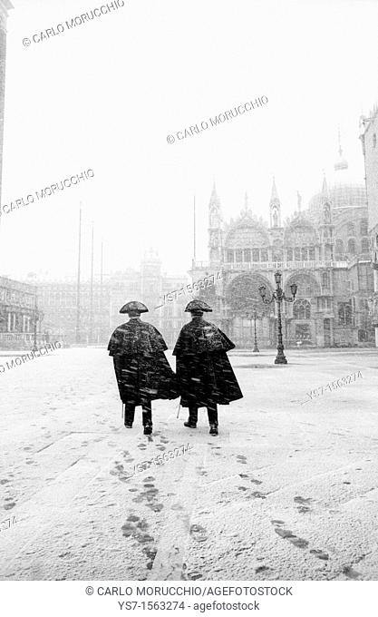 Carabinieri in San Marco square during a snowstorm - Venice Italy