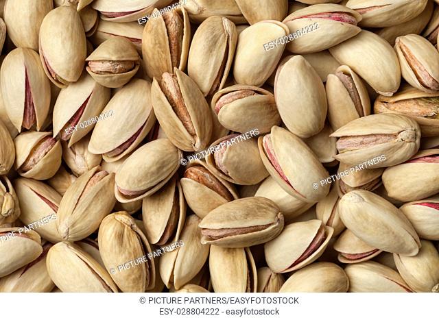 Raw unshelled pistachio nuts full frame