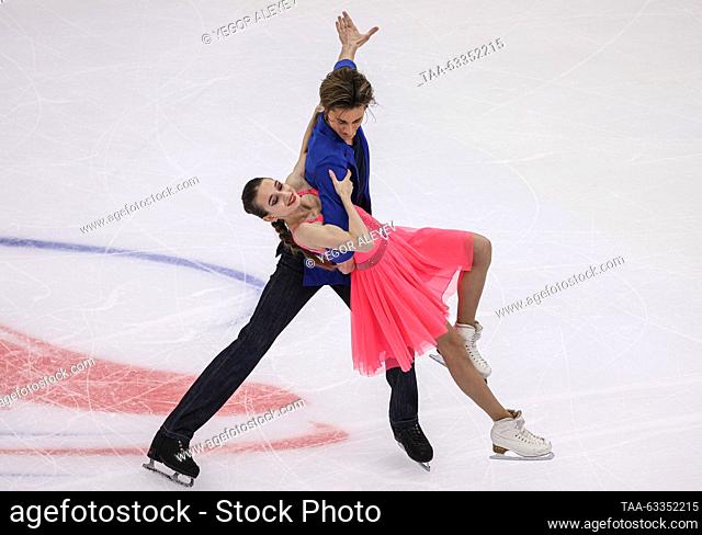 RUSSIA, UFA - OCTOBER 14, 2023: Ice dancers Alexandra Prokopets (front) and Alexander Vasilkovich perform in the ice dance rhythm dance programme during Stage 1...