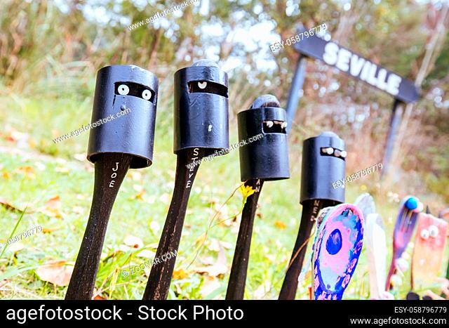 Seville, Australia - April 7 2021: The popular Lilydale to Warburton Rail Trail at Seville station with the Spoonville art display on a warm autumn day in...