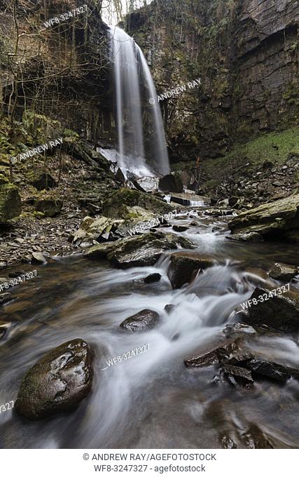 Melincourt Waterfall in the Vale of Neath in South Wales, captured in mid February using a long shutter speed to blur the movement of the water coming over the...