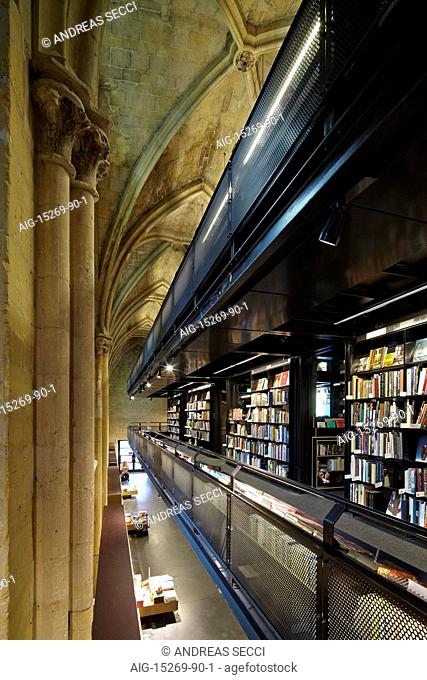 Selexyz Dominicanen Bookshop, a modern bookshop built within the historic 13th century church building. View of the display windows and the arches of the old...
