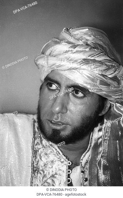 South Asian , Indian Bollywood Film Star Actor Amitabh Bachchan shot during lunch break on the sets of Khuda Gawah , India NO MODEL RELEASED