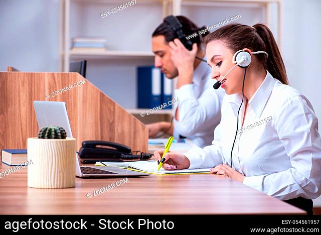 The call center operators working in the office