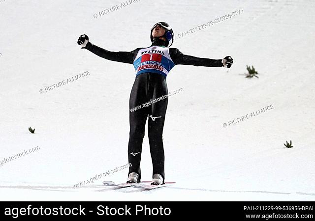 29 December 2021, Bavaria, Oberstdorf: Nordic skiing/ski jumping: World Cup, Four Hills Tournament. Ryoyu Kobayashi from Japan cheers after his jump in second...