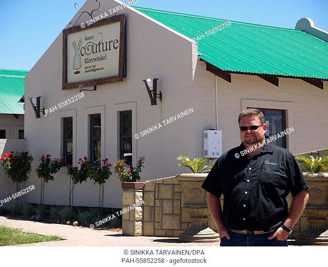 Local Businessman Sarel Roets, who owns one of Orania's shopping centres, stands in front of one of the buildings belonging to the shopping centre in Orania