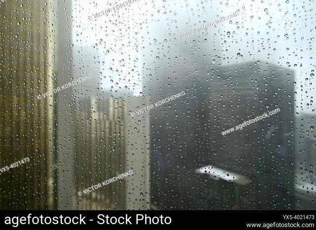 Toronto-Dominion Centre in Toronto Downtown banking district seen through rain drops on the window
