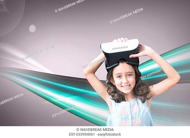 Happy girl with VR headset standing against purple background with flares and green lights