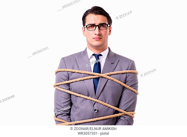 Businessman tied up with rope isolated on white