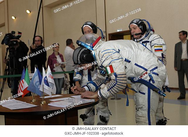At the Gagarin Cosmonaut Training Center in Star City, Russia, Expedition 3637 Flight Engineer Luca Parmitano of the European Space Agency signs in for the...