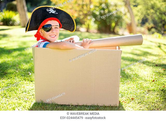 Portrait of smiling boy pretending to be a pirate