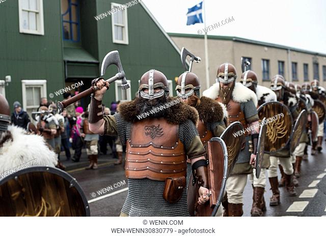 The Guizer Jarl and his squad sing songs at the Lerwick Royal British Region to parade through the town of Lerwick, Shetland