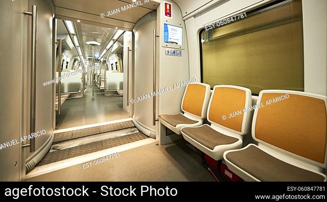 Empty seats in a modern train car