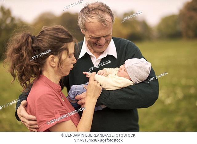 couple, baby, family, age difference, outdoors, in park, generations, Grandfather, mother, at Neuhofener Berg, Munich, Germany