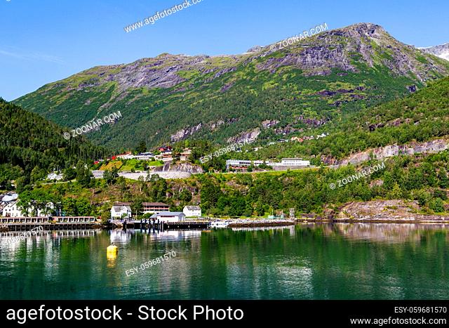 View on small village Hellesylt and ferry jetty in Gerianger fjord in More og Romsdal county in Norway