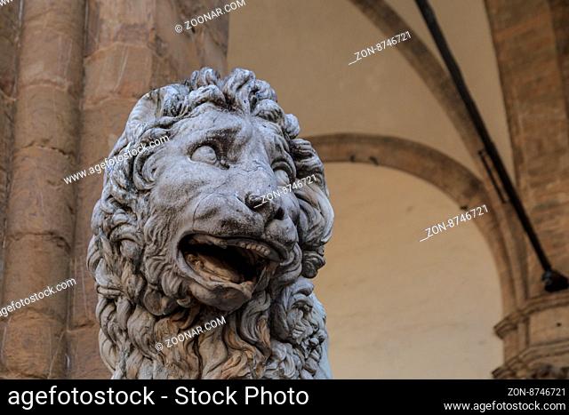 Close up view of historical granit sculptures of a lion at Piazza Della Signoria in Florence