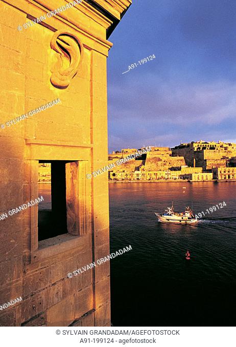 Sunrise on Valletta seen from Senglea fortress. Malta