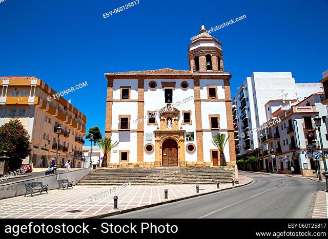 Ronda, Spain - May 31, 2019: Front view of the church Iglesia de la Merced in the historic city centre