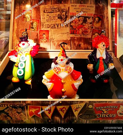 Set of vintage christmas decorations in the wooden box on showcase in shopping mall