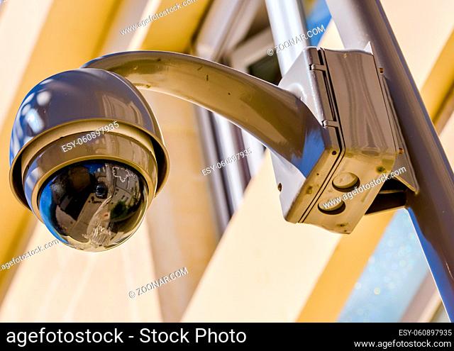 closeup on security CCTV camera or surveillance system in office building