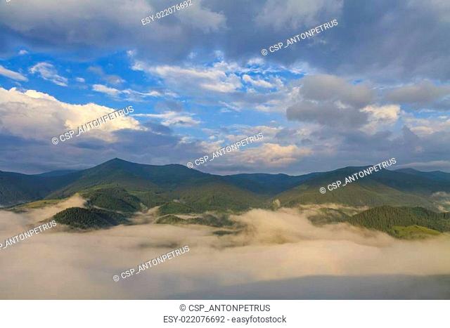 Beautiful misty dawn in the mountains. Carpathian Mountains. Ukr