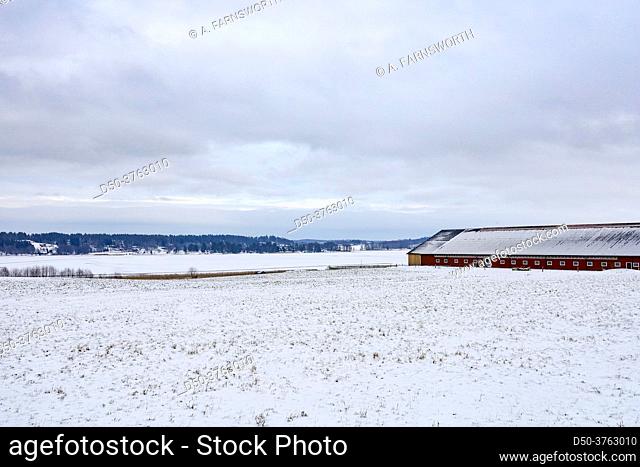 Sormalnd, Sweden A snowy and wintery landscape with a farm