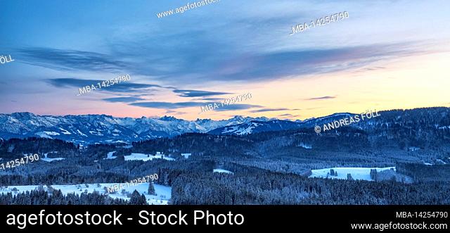 Evening glow over the winter snowy Allgäu Alps. Bavaria, Germany, Europe