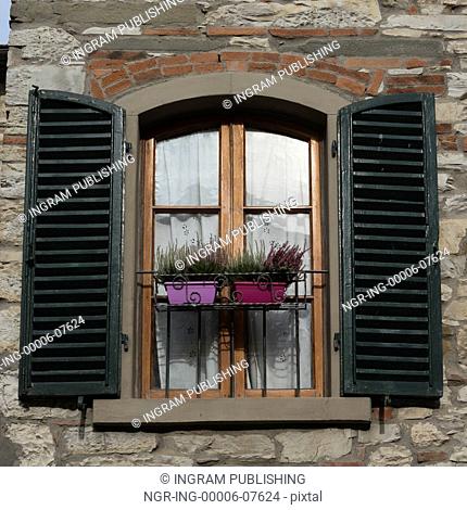 Window with shutters, Radda in Chianti, Tuscany, Italy
