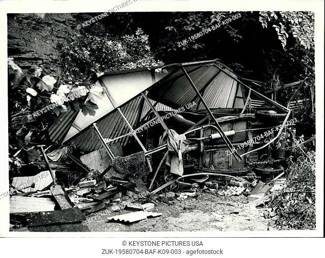 Jul. 04, 1958 - Car and Garage washed away in the sheffield floods: Photo Shows A Garage and car after it had been washed 200 yards from its mooring at Moscow...