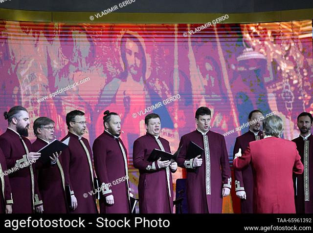RUSSIA, MOSCOW - DECEMBER 21, 2023: Valaam Monastery Choir performs at the opening of Karelia Republic Day during the Russia Expo international exhibition and...