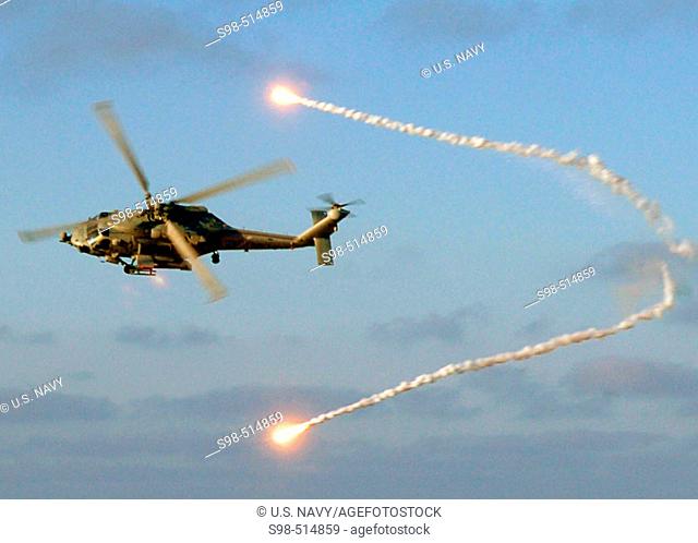 Atlantic Ocean (May 11, 2006) - An SH-60F Seahawk helicopter assigned to the 'Dragonslayers' of Helicopter Antisubmarine Squadron Eleven (HS-11) releases flares