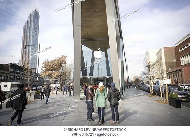 Apple enthusiasts descend on Downtown Brooklyn in New York for the grand opening of the new Apple store on Saturday, December 2, 2017