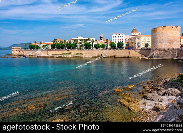 the walls over the sea and the old town of Alghero in Sardinia