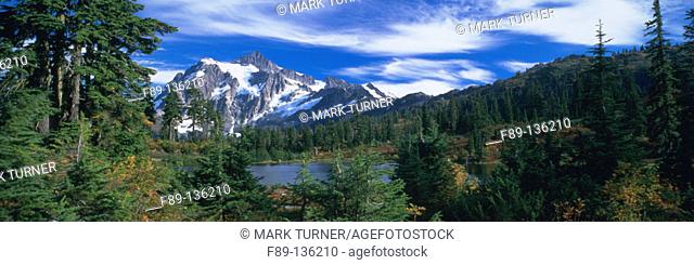 Mt. Shuksan from Picture Lake, autumn with Subalpine Firs & Mountain Hemlocks. Mount Baker-Snoqualmie National Forest. Washington. USA
