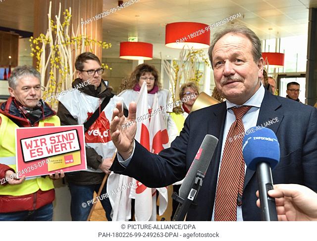 26 February 2018, Germany, Potsdam: The chairman of the German United Services Trade Union Verdi, Frank Bsirske, delivers a statement to the press at the...