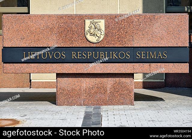 VILNIUS, LITHUANIA - MARCH 27, 2016: The bronze coat of arms of the republic Lithuania on a granite wall of nachionalny parliament