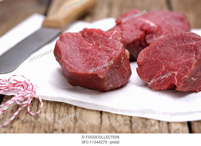 Raw beef fillet on kitchen paper