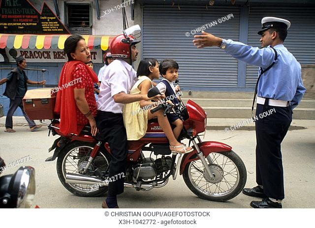 family on motorcycle, Kathmandu, Nepal, Himalaya, South Asia