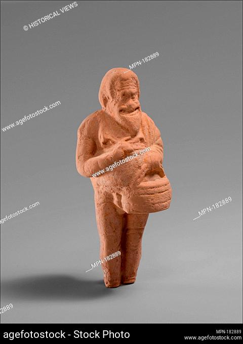 Terracotta statuette of an actor. Period: Late Classical; Date: late 5th-early 4th century B.C; Culture: Greek; Medium: Terracotta; Dimensions: H