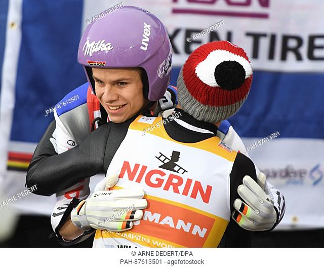 Kamil Stoch (r) from Poland and Andreas Wellinger from Germany congratulate each other at the Ski Jumping World Cup in Willingen, Germany, 29 January 2017