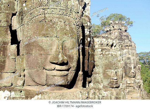 Carved stone faces of Bodhisattva Lokeshvara over the south gate of Angkor Thom, Angkor, UNESCO World Heritage Site, Siem Reap, Cambodia, Southeast Asia, Asia