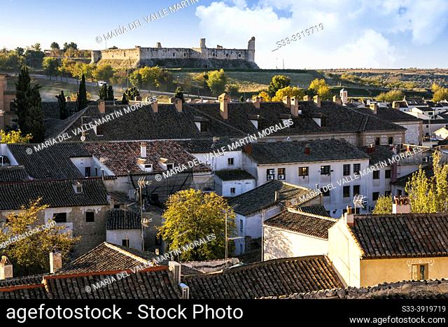 Ruins of the castle over the roofs in Chinchon. Madrid. Spain. Europe