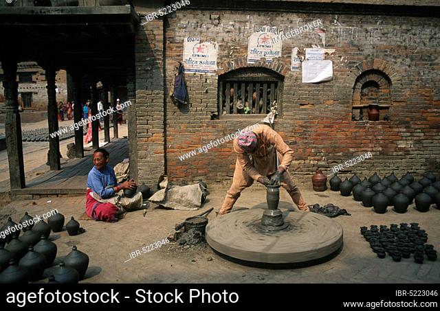 Potter at work, Potters' Square, Bhaktapur, Nepal, Potters at work, Potters' Square, Bhaktapur, Nepal, Asia