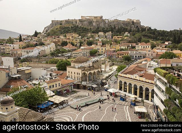 03 May 2021, Greece, Athen: The Monastiraki district with the Acropolis in the background. Greece eases the measures imposed because of the Corona pandemic
