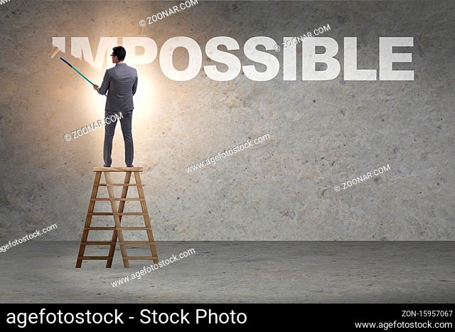 Businessman in the impossible business concept