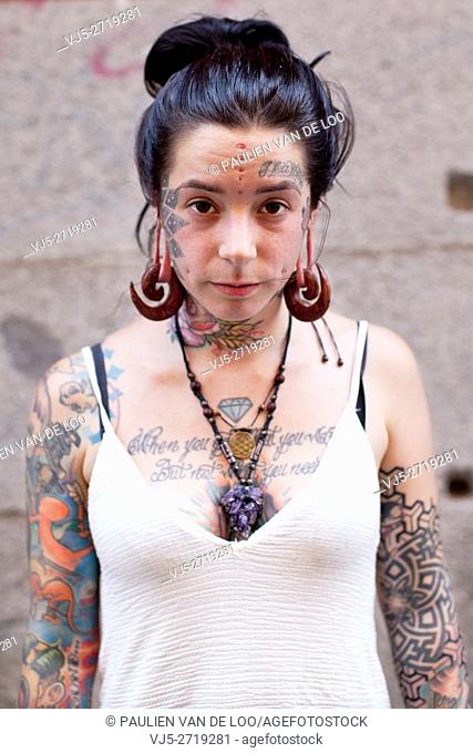 Madrid, Spain, portrait of a tattooed girl with piercings in Madrid