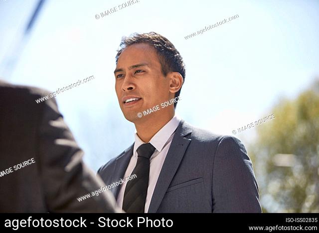 Businessman talking to his colleague