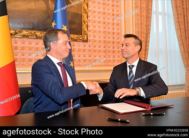 Prime Minister Alexander De Croo and Engie Belgium CEO Thierry Saegeman pictured during a press moment after an agreement was found between federal government...